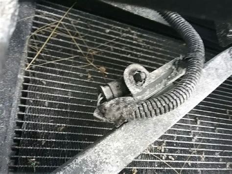 The wire loom I then tied up with tie straps. . Gmc sierra outside temperature sensor location